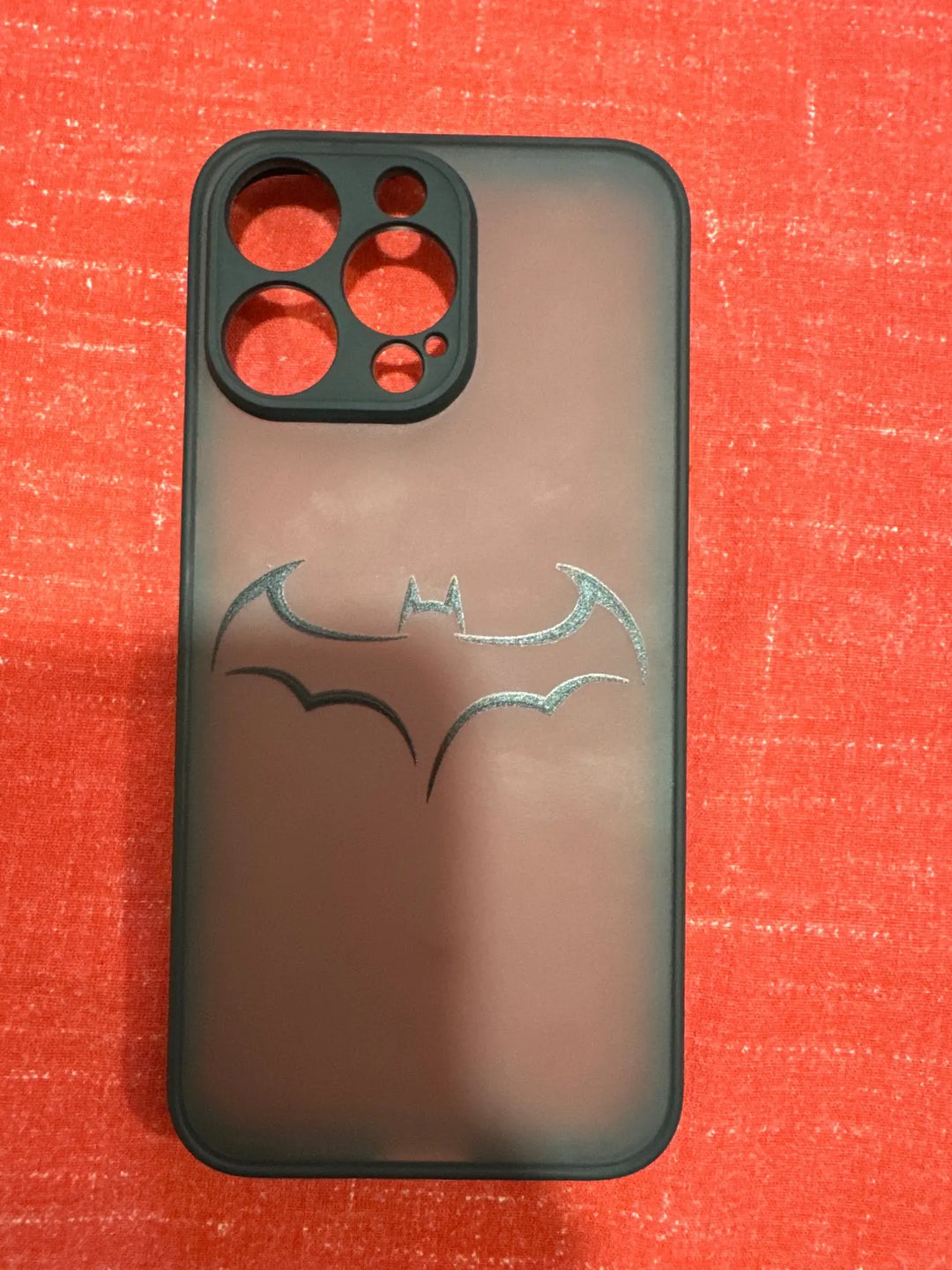 Phone case featuring the batman logo