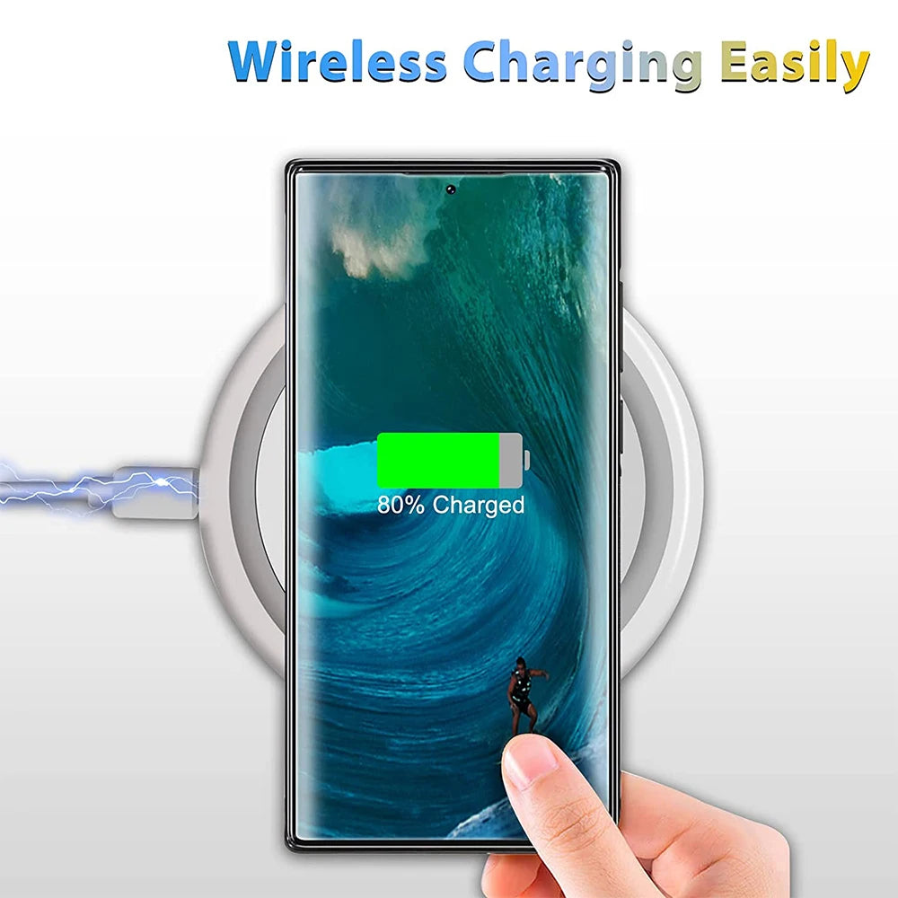 A hand holding a smartphone in a Carbon Fiber for Samsung case with a full-screen wave wallpaper, placed on a wireless charging pad. The screen displays a battery icon showing 80% charged. Above the phone, the text reads "Wireless Charging Easily" in gradient colors.