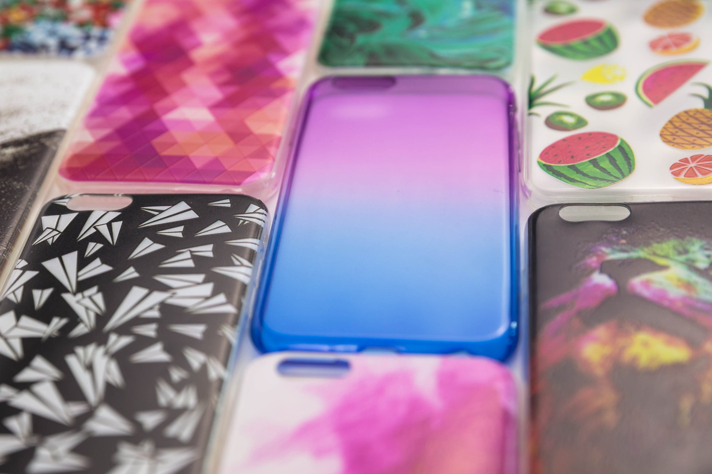 close up of several unique phone cases