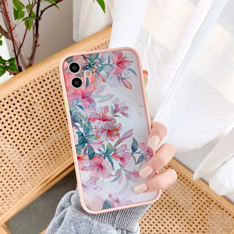 Phone case with flowers depicted in a watercolor style