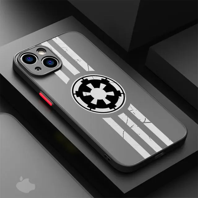 The Galactic Empire Crest for iPhone is a sleek phone case adorned with a black and white Star Wars emblem and a striped design on a dark surface. Built to be both anti-fingerprint and anti-scratch, this case preserves your phone's pristine condition while proudly displaying your loyalty to the Empire.