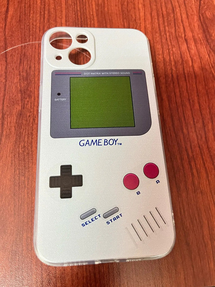 The Gameboy Case For iPhone is a silicone smartphone cover that mimics the classic Nintendo Game Boy's design, complete with a layout featuring the screen, directional pad, select and start buttons, and A and B buttons. It also includes a camera cutout at the top left corner, making it perfect for retro gaming enthusiasts.