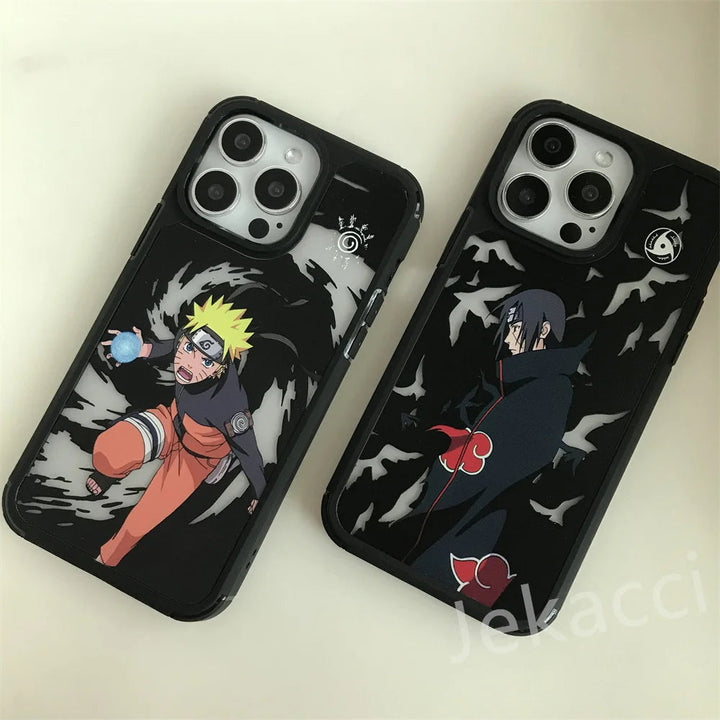 Two cases from the Hidden Leaf Legends for iPhone collection feature iconic anime characters. The left case displays Naruto, a blond character dressed in orange, jumping with a blue orb in hand. The right case portrays Itachi, a dark-haired character clad in black and adorned with a red cloud cloak.