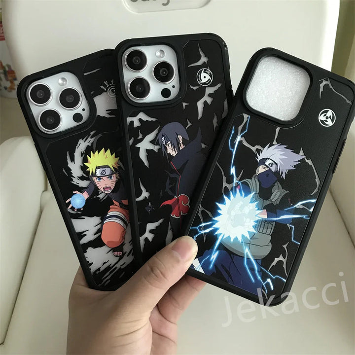 A hand holding three Hidden Leaf Legends for iPhone cases showcasing Naruto, Itachi, and Kakashi's electrifying lightning effects.