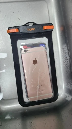 A rose gold iPhone is shown submerged in water while inside an IPX8 Waterproof Phone Pouch from TOPK, perfect for outdoor activities.