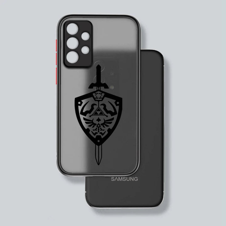 A Legend of Zelda for Samsung smartphone with a transparent black case featuring a Master Sword and Hylian shield design is placed over another smartphone.