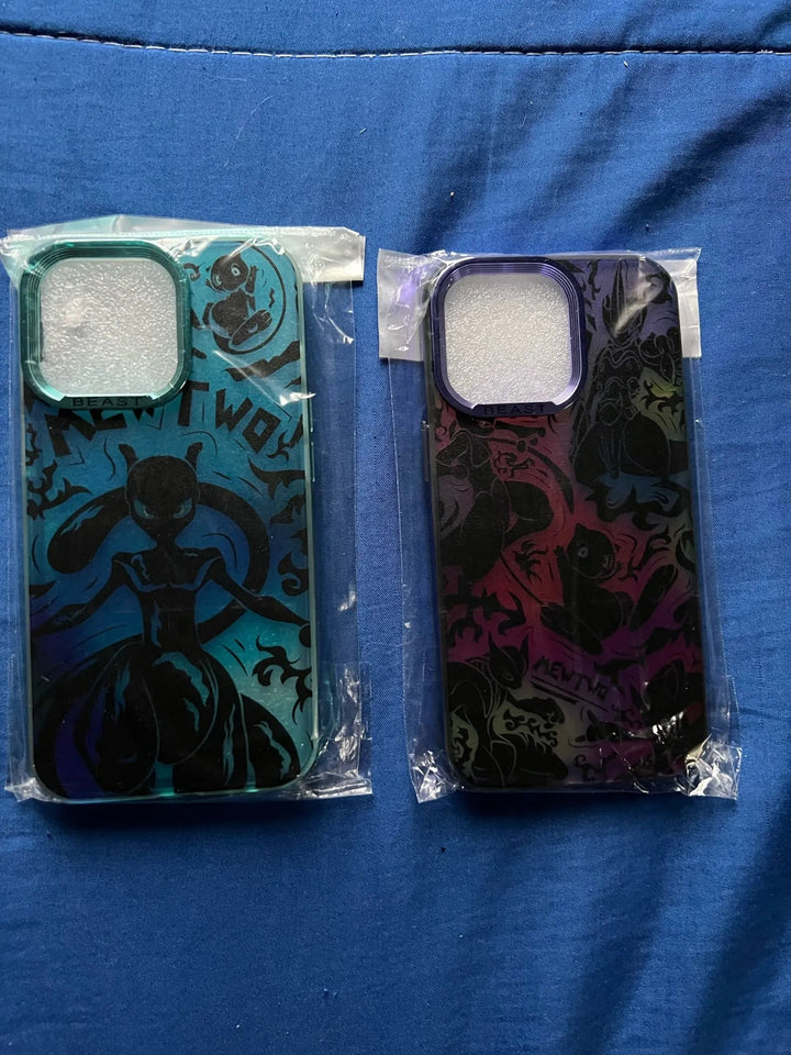 Two packaged Mewtwo for iPhone cases featuring stylized designs of Mew and Mewtwo, each depicted as a humanoid figure with long tails and large eyes. The cases are new and resting on a blue fabric background.