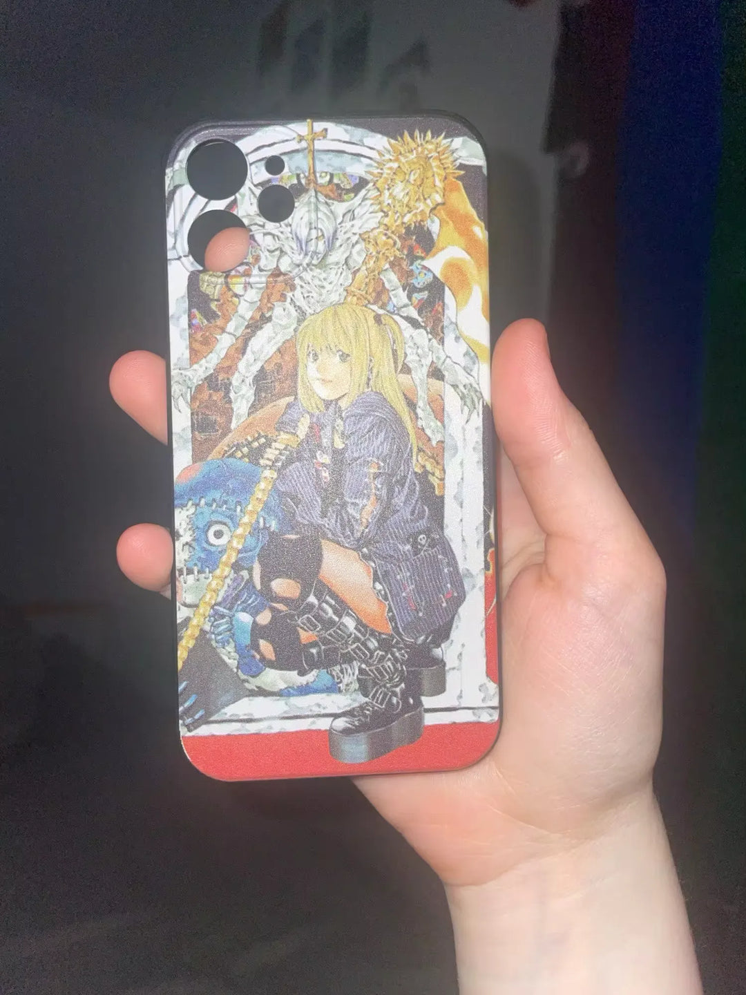 A black phone case featuring Misa Amane, a character from Death Note