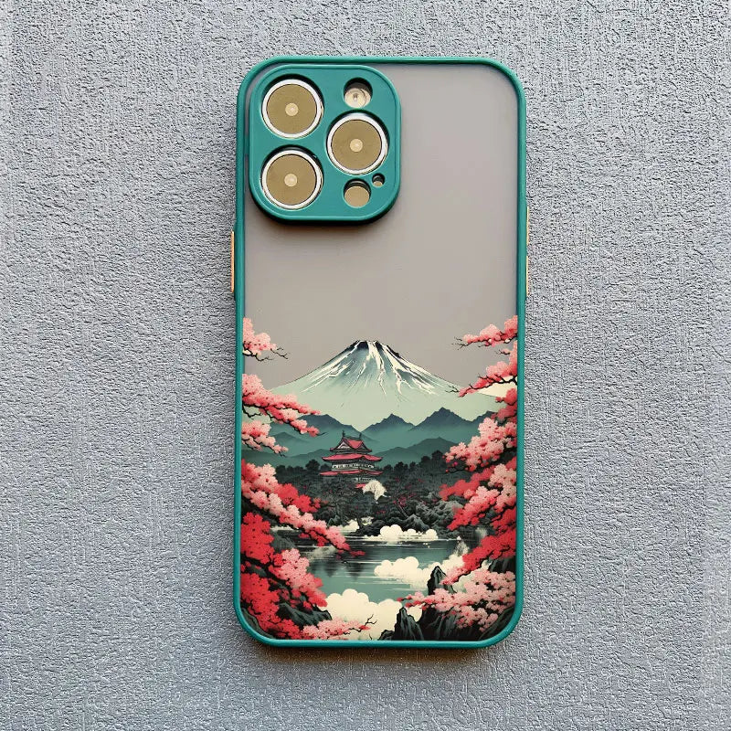 A teal phone case with a frosted back featuring a Japanese landscape with Mount Fuji, cherry blossoms, and a temple