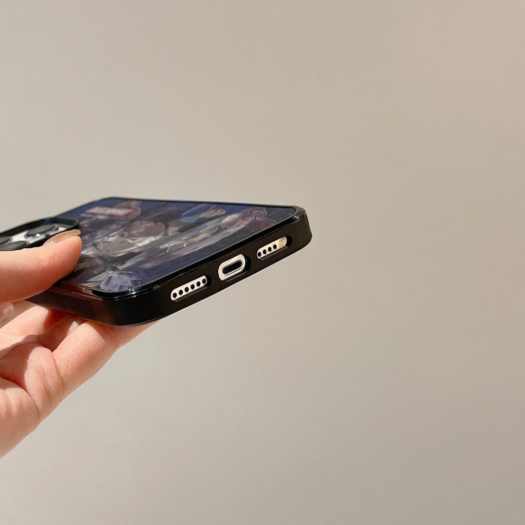 A hand holds a smartphone adorned with the vibrant, 3D effect Orochimaru Angle Art case, highlighting the bottom edge where the speaker grills and charging port are visible. The phone is MagSafe compatible.