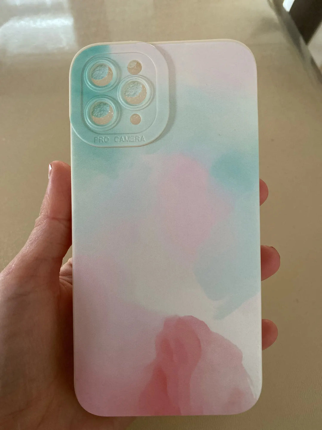 watercolor phone case with soft, blended edges and a cloud-like appearance.