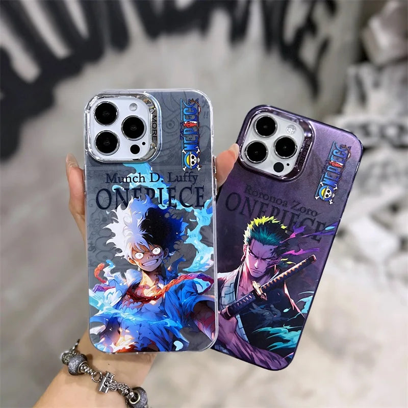 Two "Pirates for iPhone" cases depicting beloved characters from "One Piece." The left case showcases Monkey D. Luffy, while the right case features Roronoa Zoro. Both hands hold the cases against a blurred background, highlighting their vibrant designs.