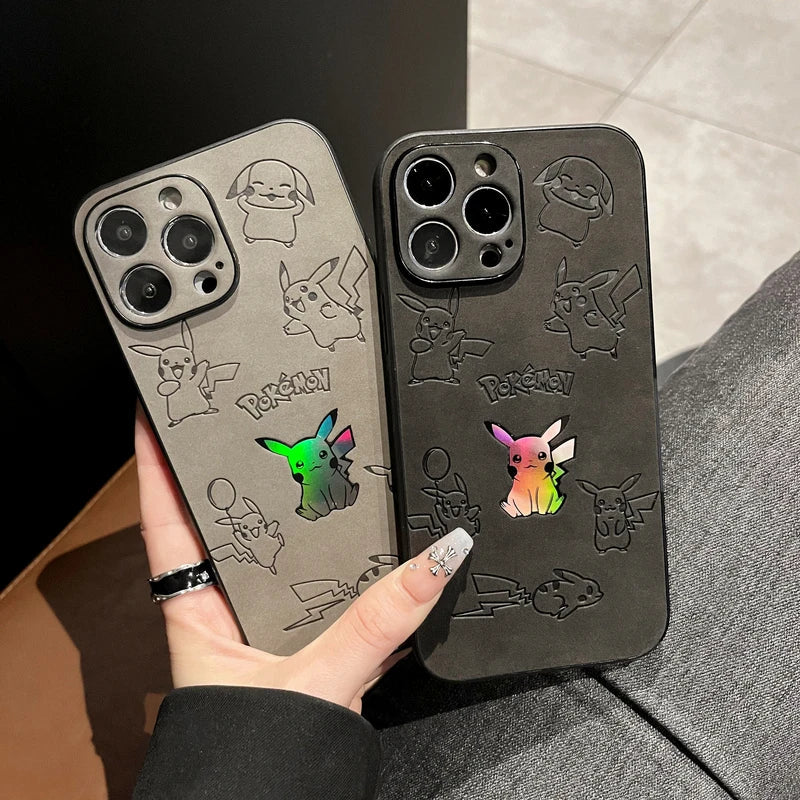 Two Retro Pikachu for iPhone cases, featuring retro-inspired Pikachu illustrations and holographic outlines, are shown being held by a hand with decorated nails.