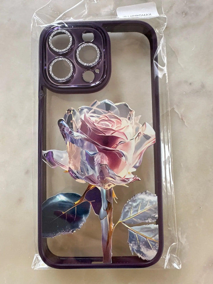 A phone case with a clear, transparent back featuring a vibrant rose design