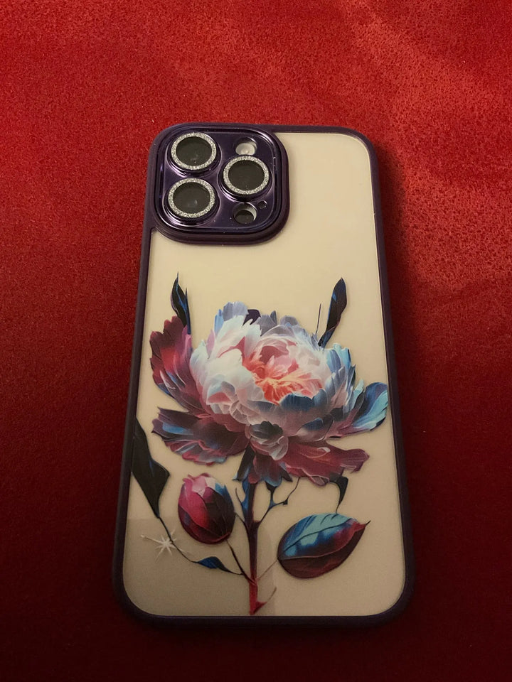 A phone case with a clear, transparent back featuring a vibrant rose design