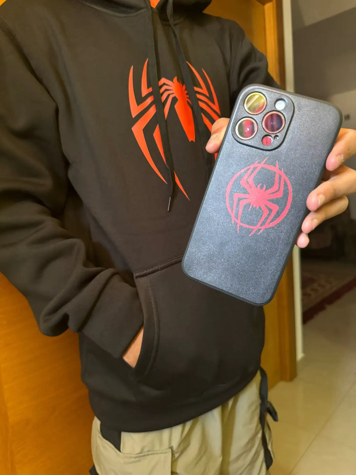 A black phone case with a red and black Spider-Man emblem