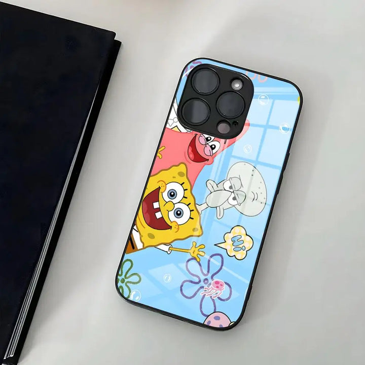  A glass phone case featuring SpongeBob SquarePants, Patrick Star, and Squidward Tentacles standing together on a blue background with bubbles and flowers