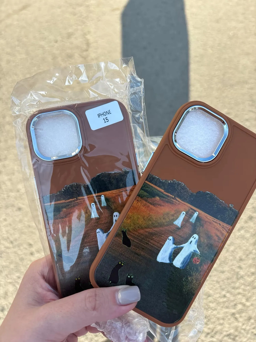 Phone case of cute ghosts on trail