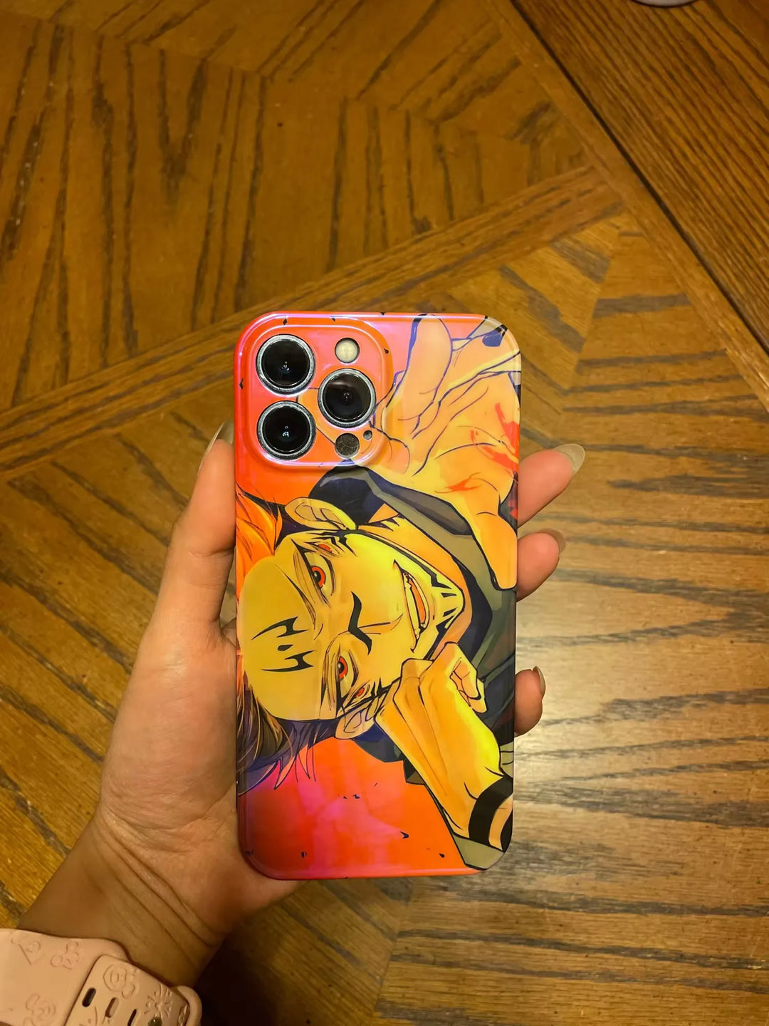 A phone case featuring Sukuna from Jujutsu Kaisen, a powerful and ancient curse. Sukuna is depicted with a menacing expression and surrounded by dark, ominous energy.