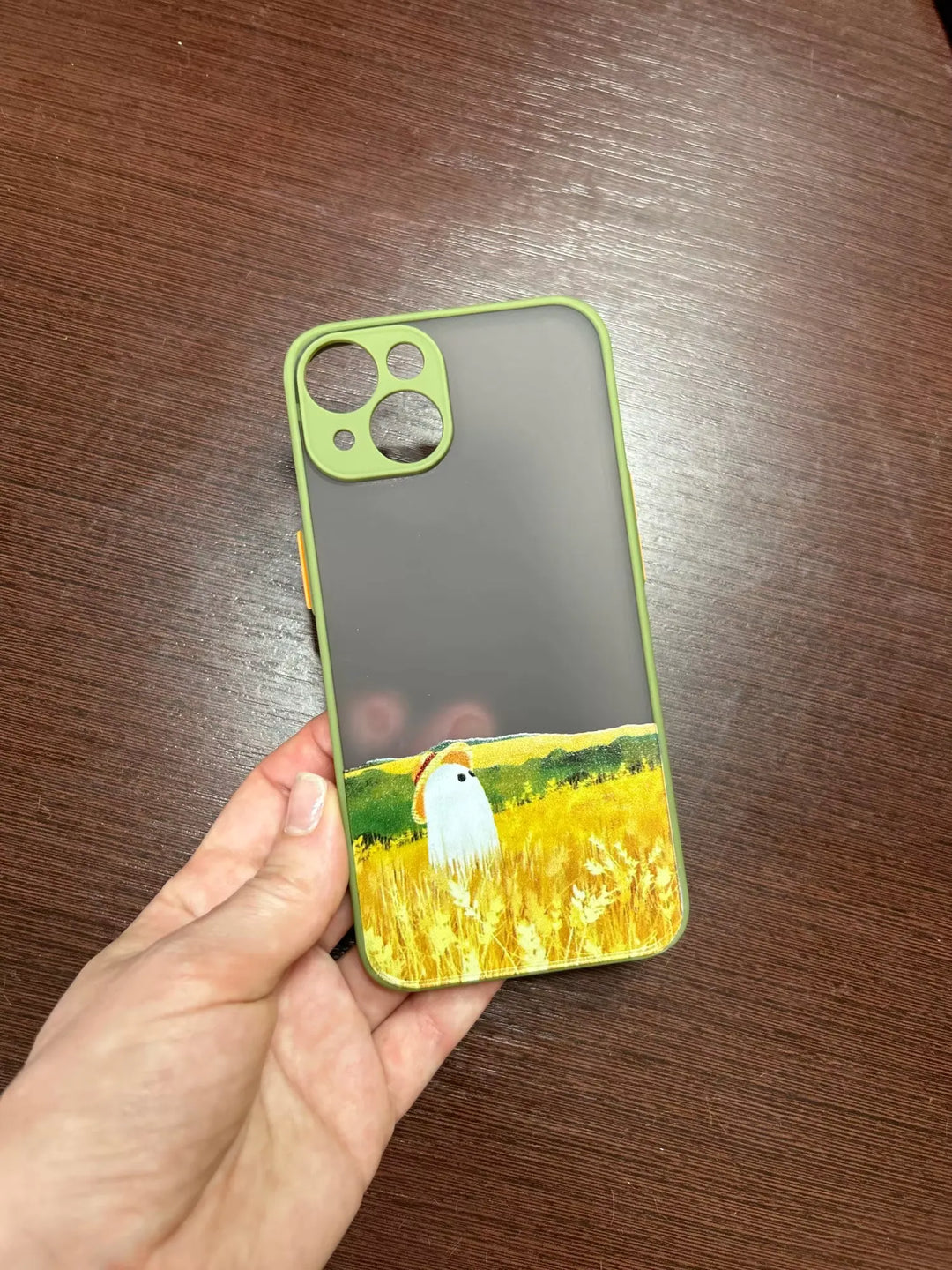 Phone case of cute ghost in bright field