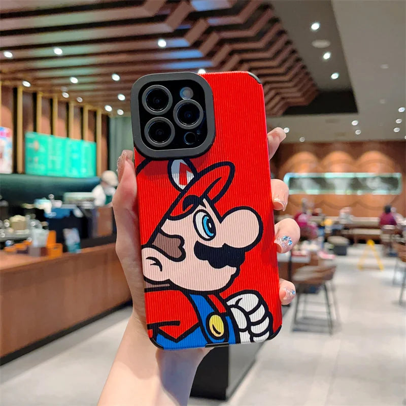 Person holding an iPhone with a Super Mario for iPhone hard plastic protective case inside a modern coffee shop.