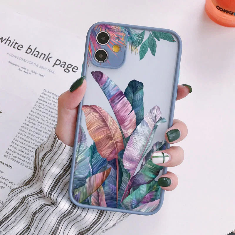 Photo of frosted phone case with a vibrant tropical leaf design