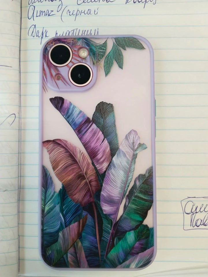 Photo of frosted phone case with a vibrant tropical leaf design