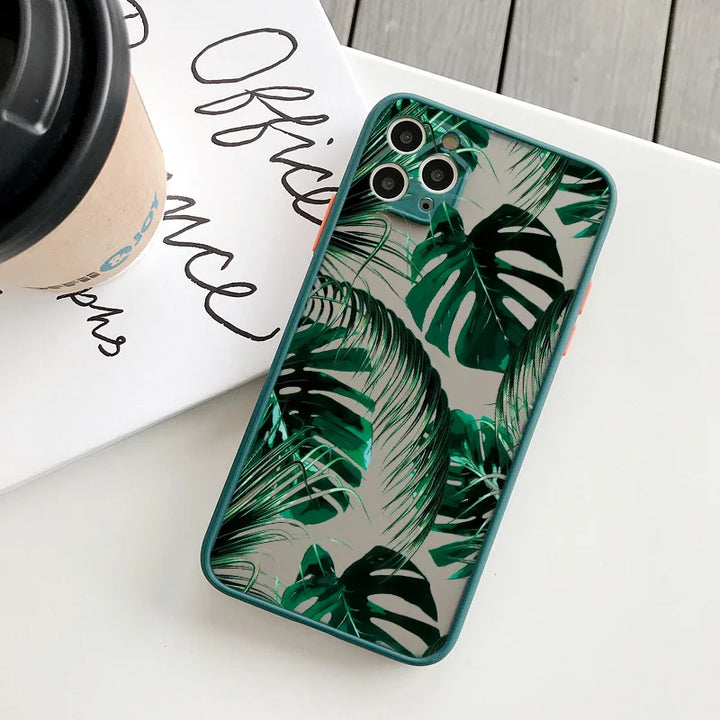 Photo of frosted phone case with a vibrant tropical leaf design