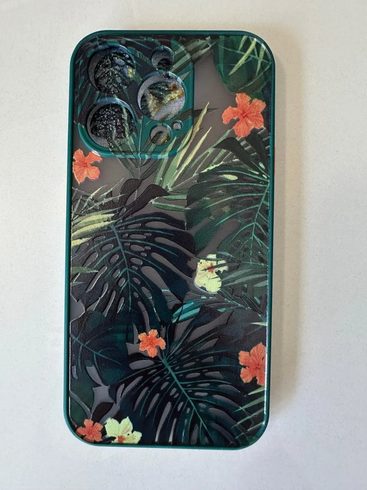 Photo of frosted phone case with a vibrant tropical leaf design