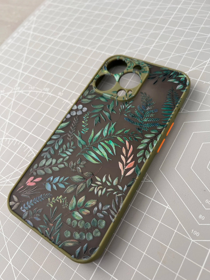 Photo of frosted phone case with a vibrant tropical leaf design