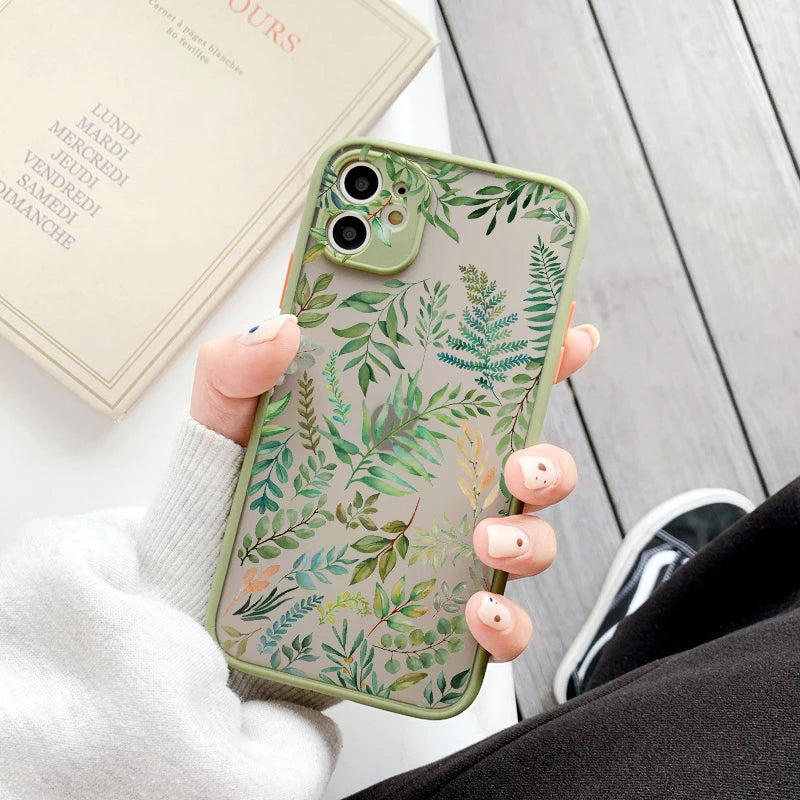 Photo of frosted phone case with a vibrant tropical leaf design