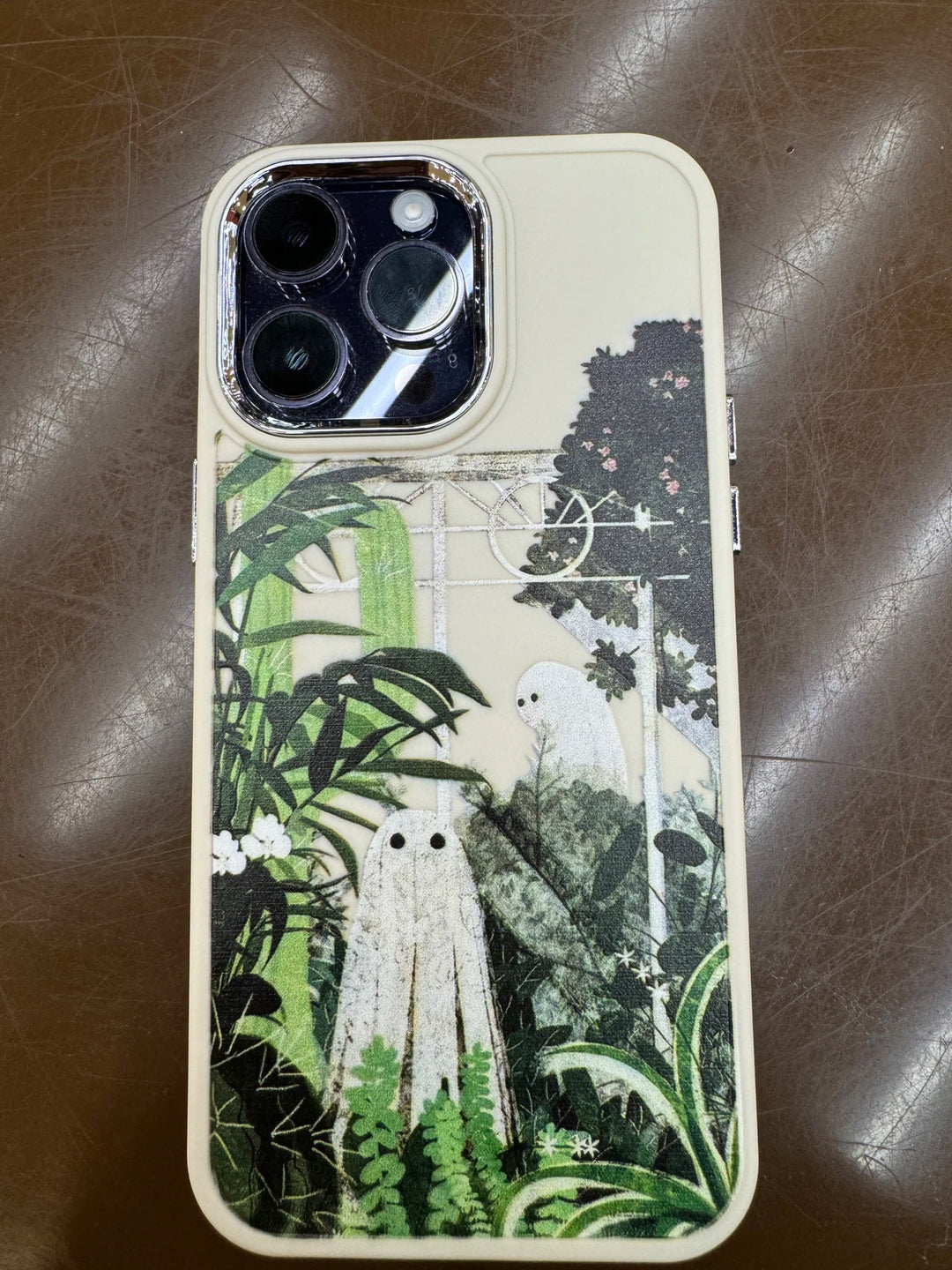 Phone case of cute ghosts in tropical garden