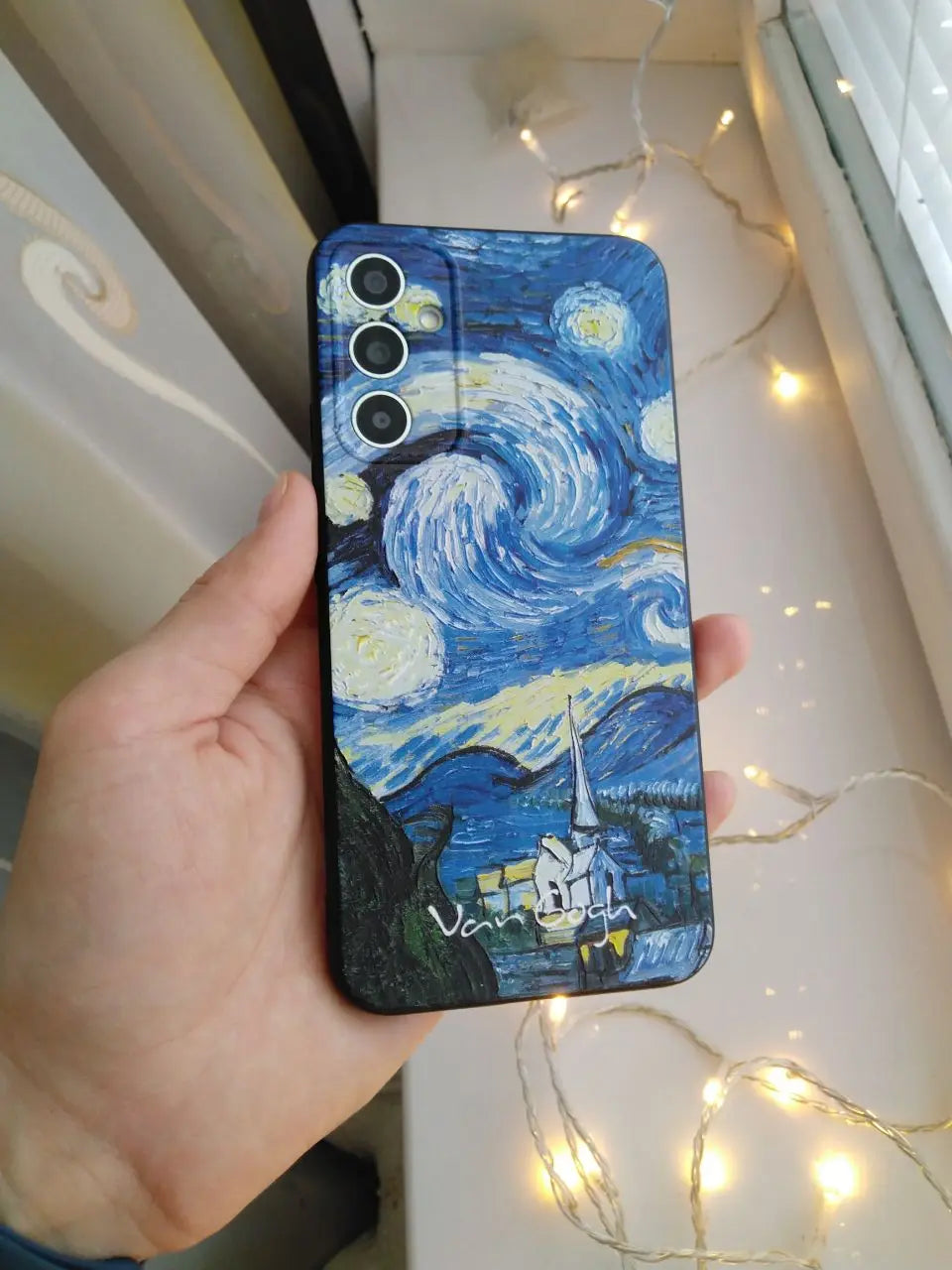 Van Gogh's Starry Night Samsung case in hand