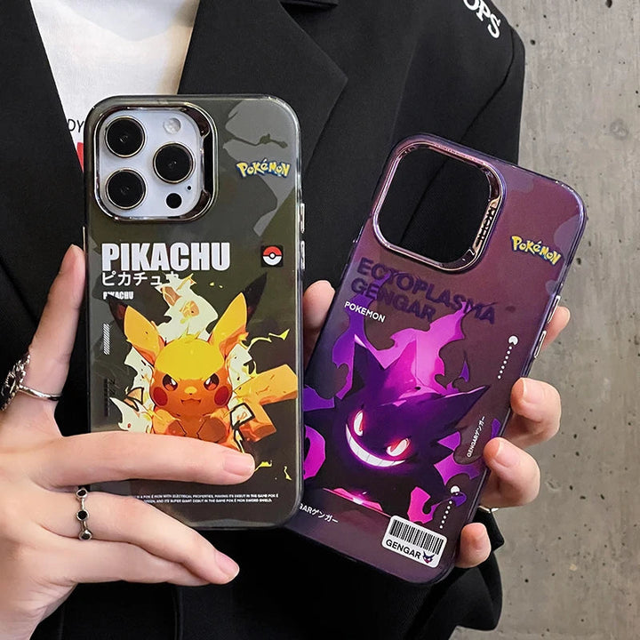 Two smartphone cases are held side-by-side. The left one, from the Vibrant Plating Pokémon Case for iPhone series, features Pikachu on a gray background. The right one highlights Gengar on a purple background. Both designs showcase intricate Japanese text and classic Pokémon flair, while also offering an anti-scratch surface for added durability.