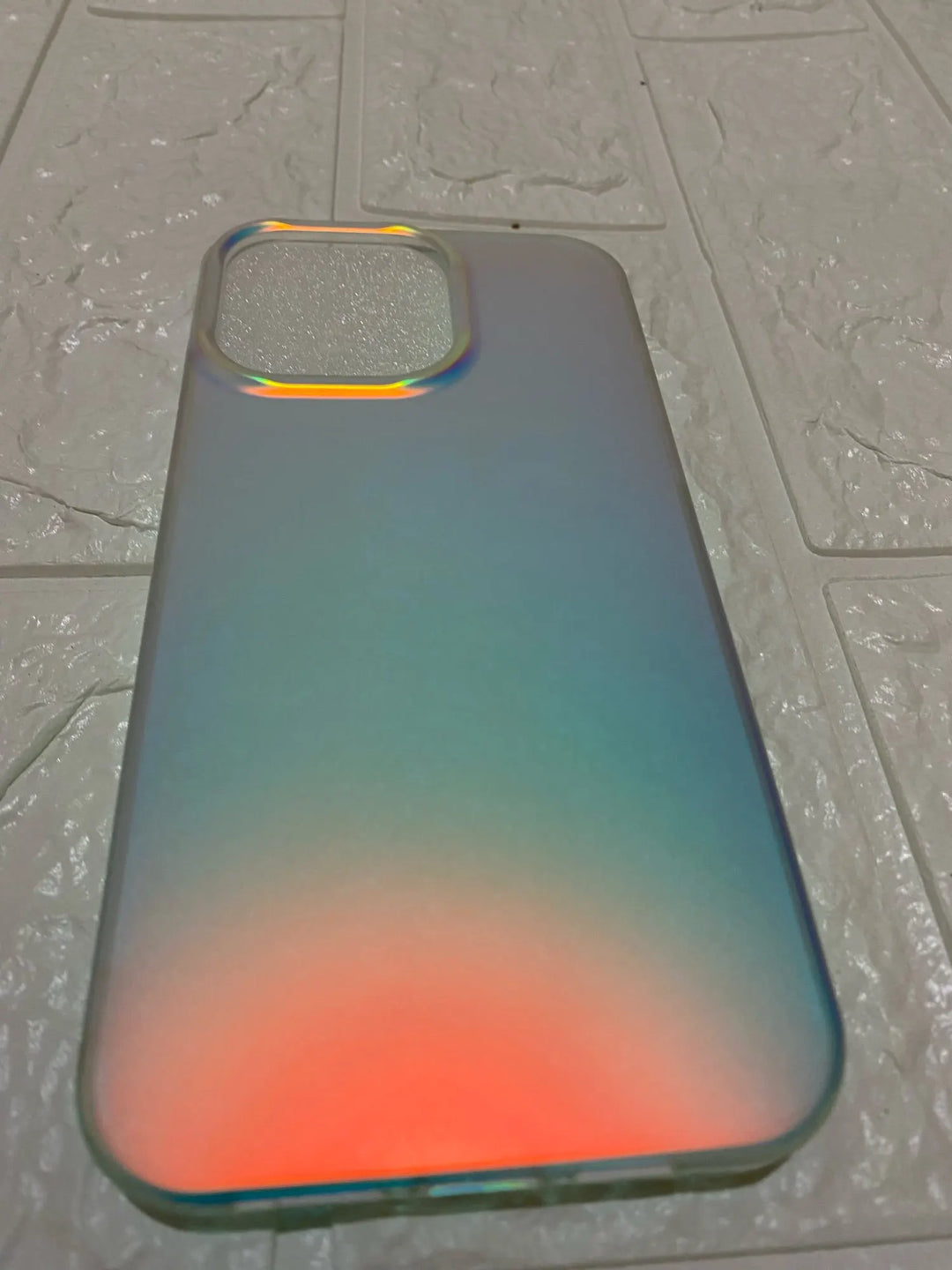 white gradient phone with blue and orange hue